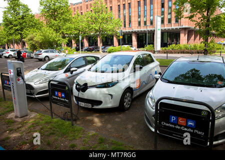 Renault ZOE of the carsharer Cambio at a charging station of the Mobilstation on the Charles-de-Gaulle square in the district Deutz, Cologne, Germany. Stock Photo