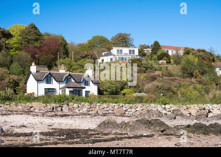 Detached houses overlooking the beach at Rockcliffe, Dumfries and Galloway, Scotland, UK Stock Photo