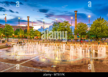 ATLANTA, GEORGIA - AUGUST 21, 2016: Visitors play in Centennial Olympic Park's landmark fountains. The Park was built for the 1996 Summer Olympics and Stock Photo