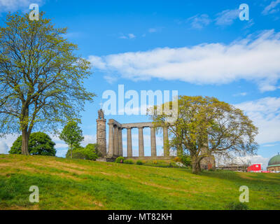 View of the National Monument of Scotland and the Nelson Monument, on Calton Hill in Edinburgh. Stock Photo