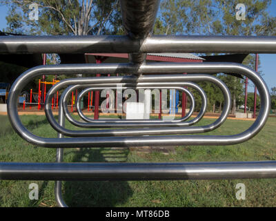 In the local park this bicycle rack is provided for the park users and is near the childrens playground Stock Photo