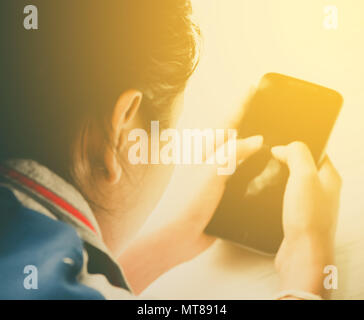 Women hand holding a smart phone Stock Photo