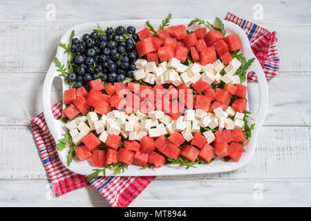 Patriotic American flag salad with blueberry, watermelon and feta Stock Photo