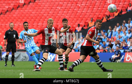 Coventry City's Jordan Willis (left) scores his side's first goal of the game during the Sky Bet League Two Final at Wembley Stadium, London. Stock Photo