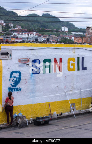 San Gil, Santander / Colombia - 28 april 2018 : Supporters of candidate Petro painting on a wall. Stock Photo