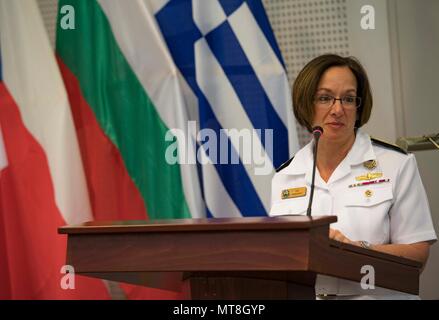 SOUDA BAY, Greece (May 11, 2018) Vice Adm. Lisa Franchetti, commander, U.S. 6th Fleet, delivers remarks during the closing ceremony of exercise Phoenix Express 2018 in Souda Bay, Greece, May 11. Phoenix Express is sponsored by U.S. Africa Command and facilitated by U.S. Naval Forces Europe-Africa/U.S. 6th Fleet, and is designed to improve regional cooperation, increase maritime domain awareness information sharing practices, and operational capabilities to enhance efforts to achieve safety and security in the Mediterranean Sea. (U.S. Navy photo by Mass Communication Specialist 2nd Class Ryan U Stock Photo