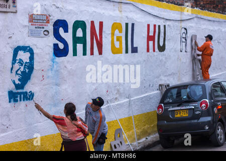 San Gil, Santander / Colombia - 28 april 2018 : Supporters of candidate Petro painting on a wall. Stock Photo