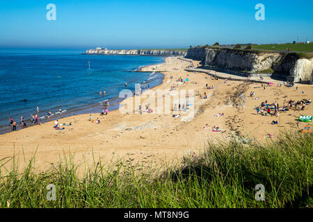 Crowds of beachgoers in the summer at Palm Bay sandy beach near Margate, Kent, UK Stock Photo