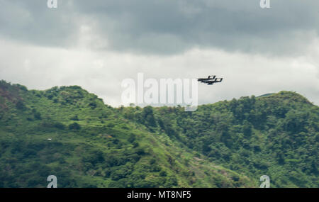 Two Philippine Air Force OV-10 Broncos from the 16th Attack Squadron, 5th Strike Wing, fly over head during a combined arms live fire exercise at Colonel Ernesto Ravina Air Base, Tarlac, Philippines, during Exercise Balikatan May 15, 2018. The CALFEX event showcased the orchestration of air and ground troops to seize an objective and was designed to integrate the Philippine and U.S. forces in a combined arms scenario and to expose them to the benefits of integrated fires. Exercise Balikatan, in its 34th iteration, is an annual U.S.-Philippine military training exercise focused on a variety of  Stock Photo