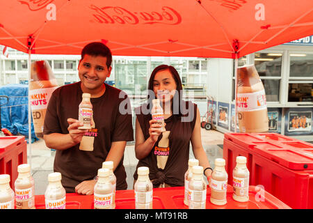 New York, NY - May 28, 2018: Dunkin Donuts representatives display French vanilla iced coffee during Memorial Day celebration at Intrepid Sea, Air & Space Museum Credit: lev radin/Alamy Live News Stock Photo