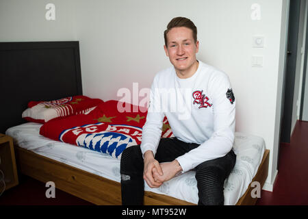 22 March 2018, Germany, Munich: U-19 goalkeeper Ron-Thorben Hoffmann of the German Bundesliga soccer club FC Bayern Munich sits in his room at the boarding school of the FC Bayern Campus. The youth training centre is the athletic home of the A- to F- junior players as well as the women's team of the German record champion. Photo: Andreas Gebert/dpa Stock Photo