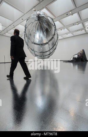 London, UK.  29 May 2018. Gallery staff view 'Willing To Be Vulnerable', 2015-16, by Lee Bul at a preview of 'Lee Bul: Crashing', a major new exhibition at the Hayward Gallery featuring work by one of Asia's most acclaimed contemporary artists.  The exhibition runs 30 May to 19 August 2018.  Credit: Stephen Chung / Alamy Live News Stock Photo