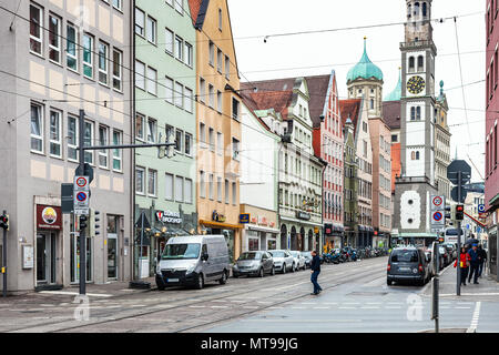 AUGSBURG, GERMANY - MAY 20, 2018: people on Karolinenstrasse and view of Perlachturm tower and Town Hall in Augsburg. Augsburg is a city in Swabia, Ba Stock Photo