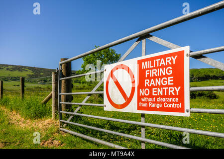 Red No Entry Sign outside the Lulworth Ranges, military firing ranges located between Wareham and Lulworth in Dorset, England, UK Stock Photo