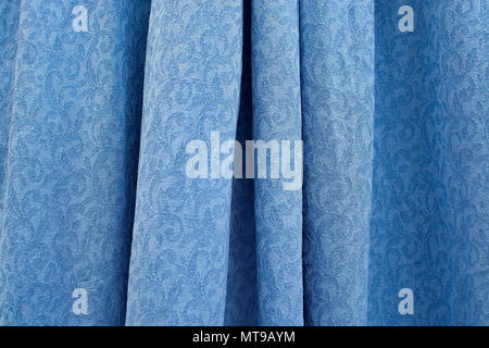 Beautiful blue folded damask woven cotton fabric background texture horizontal Stock Photo