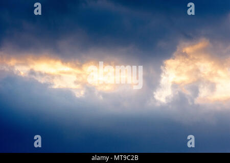 Background of the sky with clouds at sunset. Stock Photo
