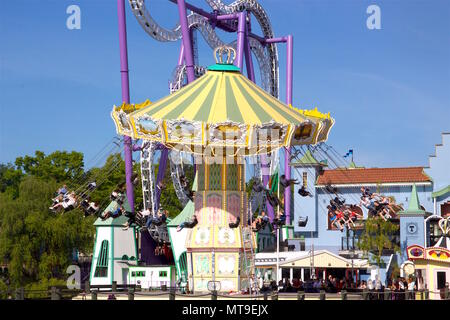 Merry-Go-Round Carousel in amusement theme park, Tivoli Gröna Lund (Luna Park), Djurgarden, Stockholm, Sweden