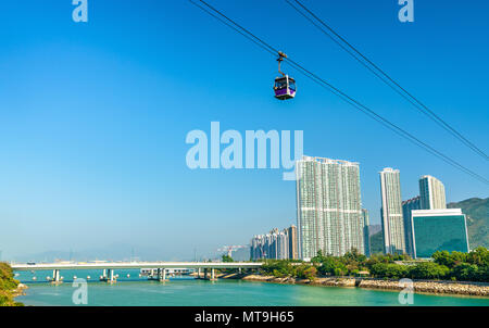 Cable car above Tung Chung Bay in Hong Kong on Lantau Island Stock Photo