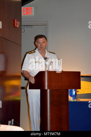 Virginia Beach, Va. (April 19, 2017) Rear Adm. Brian Brakke, commander, Navy Expeditionary Combat Command, speaks at the change of command of Expeditionary Combat Readiness Center (ECRC). Capt. Matthew Jackson relieved Capt. Joseph Rehak at a ceremony on Joint Expeditionary Base Little Creek-Ft. Story. ECRC provides processing, equipping, training, certification and proactive family support to ADSW Sailors, Individual Augmnetees and provisional units throughout all deployment phases in support of COCOM requirements, contingency operations, or national crises. Stock Photo