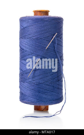 spool of purple threads on a white isolated background Stock Photo