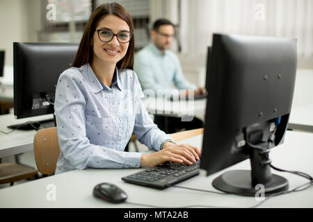 Young couple learning in the classroom Stock Photo
