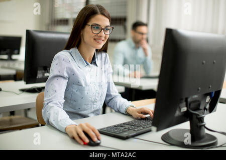 Young couple learning in the classroom Stock Photo