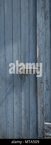Peeling Paint weathered Door Grey Blue in colour Stock Photo