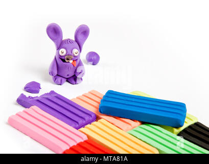Children's toy made from plasticine on white background Stock Photo