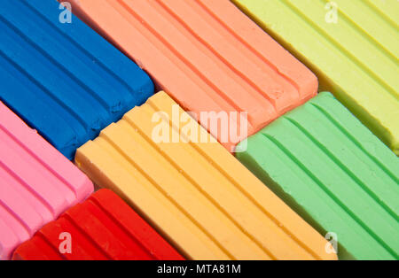 Multi-colored children's plasticine, background. Close up Stock Photo