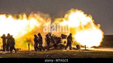 Artillerymen from the Romanian 285th Field Artillery Battalion fire am M1981 152mm towed gun-howitzer during a combined arms live-fire exercise with the U.S. Company C, 1st Battalion, 8th Infantry Regiment, and Battery A, 3rd Battalion, 29th Field Artillery Regiment, at Smardan Training Area, Romania, April 20, 2017. Both U.S. units are with the 3rd Armored Brigade Combat Team, 4th Infantry Division, conducting bilateral training with the Romanian 282nd Mechanized Brigade as part of U.S. Army Europe's Atlantic Resolve mission, which provides a persistent presence to deter aggression in eastern Stock Photo