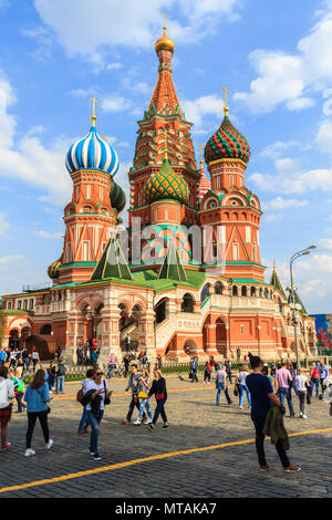 Moscow, Russian - April 30, 2018: Tourists visit Saint Basil's Cathedral in Red Square at Moscow, Russia. Stock Photo