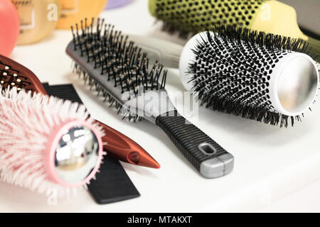 Various combs on a table Stock Photo