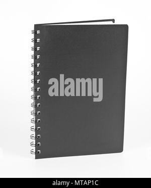 Ring notebook with black cover on white background Stock Photo