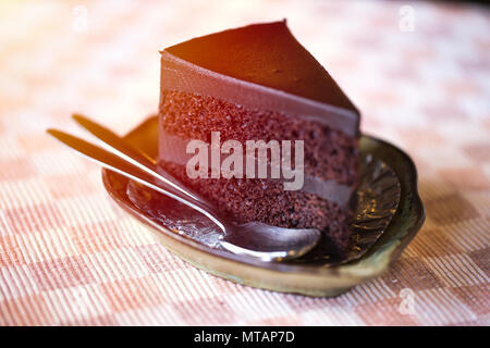 brownie cake dessert sweet with layer of chocolate cream. Stock Photo