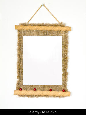 Old wooden picture frame hanging on a rope Stock Photo - Alamy