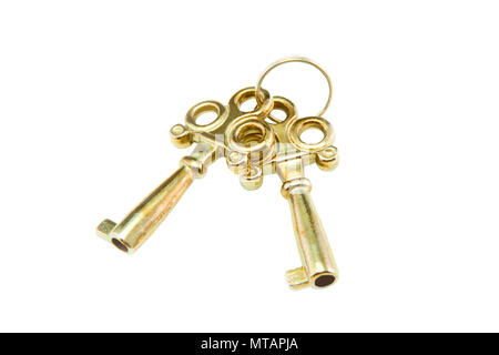 Gold keys isolated on white background. Stock Photo