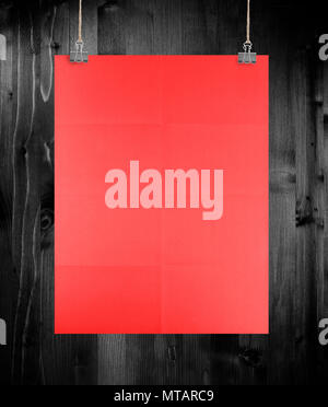 Red poster on a wood wall Stock Photo