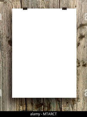 blank white folding paper flyer on a wooden background Stock Photo