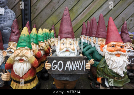 Welcome and Go Away garden gnomes mirror the UK's divided public opinion relating to Brexit Stock Photo