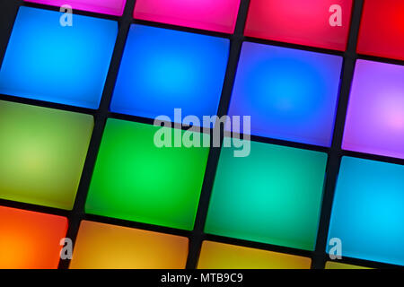 Close up view of back lit colorful buttons of a sound recording pad Stock Photo