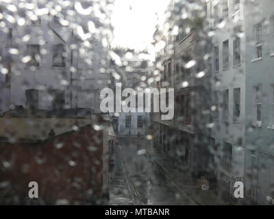 View of a London street, through a window with raindrops on it Stock Photo
