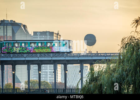 Aerial metro on Bir Hakeim bridge at sunset in Paris France Stock Photo