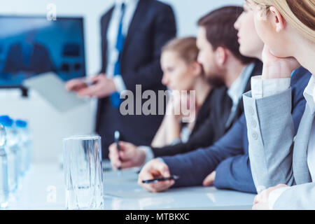 Firm management during business meeting in light office, blurry picture Stock Photo