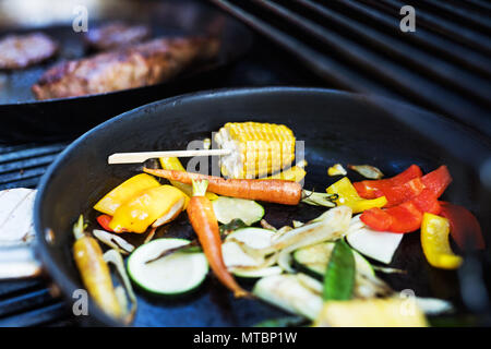 Vegetables on the grill. Garden party outside in the backyard. Stock Photo