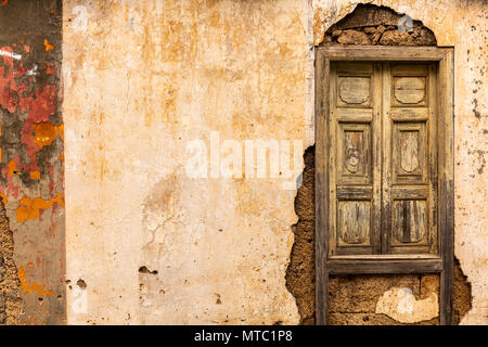 Abstract details of old wooden windows, neglected with peeling paintwork and broken glass, Vilaflor, Canary Islands, Spain, Stock Photo