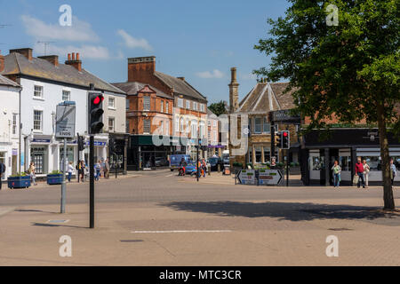 Busy road junction seen from the market square, Market Harborough, a Market town within the Harborough district of Leicestershire, England Stock Photo