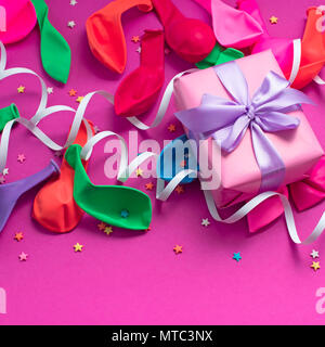 Festive background decorative composition materials for celebration and decoration. The view from the top flat lay. Purple Pink background Stock Photo
