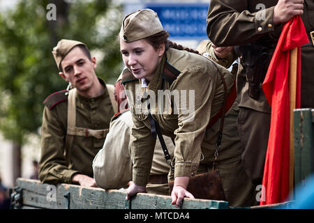 People in military uniform in honor of the Victory Day holiday. Military historical society, reconstruction of the appearance of fighters of the Secon Stock Photo