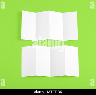 Blank folding page booklet on green background Stock Photo