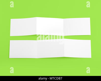 Blank folding page booklet on green background Stock Photo